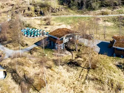 an aerial view of a house with a roof at 5 person holiday home in LONEVÅG-By Traum in Lonevåg