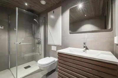 a bathroom with a sink and a toilet and a shower at Mountain nest in Hemsedal close to the ski slopes in Hemsedal