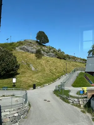 a winding road on top of a hill at Leilighet i Ålesund. in Ålesund