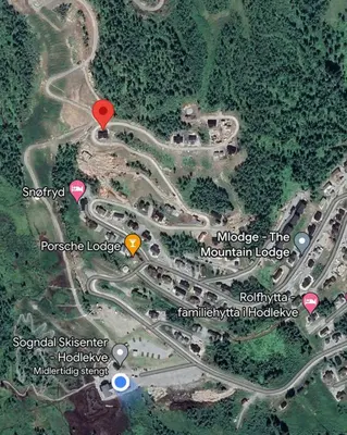 a map of a road with a red marker at Rindabakkane Lodge in Sogndal
