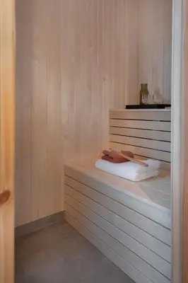 a room with a bed with avisor at 7 Min to Fjord - Alpine Stay in Stranda in Stranda