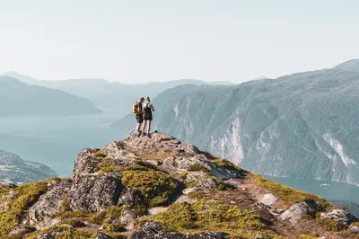 two people standing on top of a mountain at 7 Min to Fjord - Alpine Stay in Stranda in Stranda