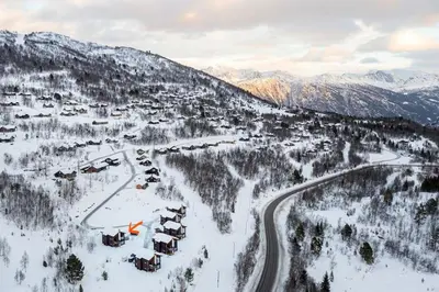 an aerial view of a ski resort in the snow at Ground Floor Exclusive Apartment with Sauna - Near Geiranger and the Norwegian Fjords in Stranda