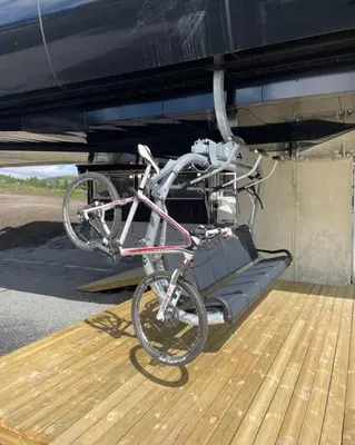 a bike parked on the side of a boat at Bualie - Golsfjellet - Biking, swimmming, hiking. High standard. in Gol