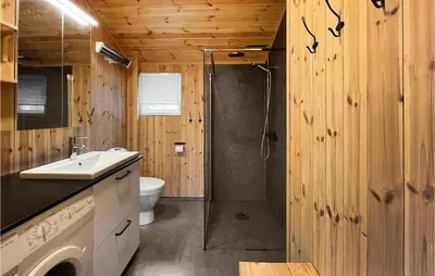a bathroom with a shower and a sink at 3 Bedroom Amazing Home In Lillehammer in Lillehammer