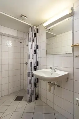a bathroom with a sink and a mirror at Hallingparken in Gol