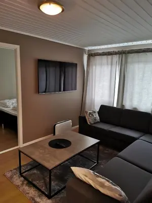 a living room with a couch and a coffee table at Bøvervegen 19 Appartment nr 9 in Bjorli