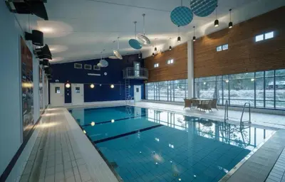 a large swimming pool in a building at Bøvervegen 19 Appartment nr 9 in Bjorli