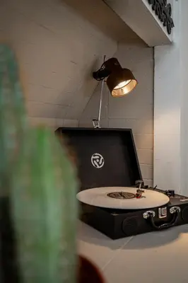 a table with a tv and a sink in a room at Fjord view apartment in Ålesund with free parking in Ålesund