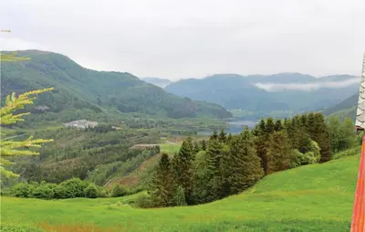 a view of a valley with mountains and a lake at Amazing Home In Dale I Sunnfjord in Gjølanger