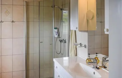 a bathroom with a sink and a shower at Amazing Home In Eggedal With Kitchen in Eggedal