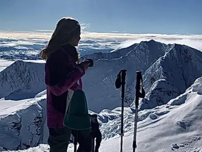 a woman standing on top of a snow covered mountain at 6 person holiday home in Sollia-By Traum in Brenn