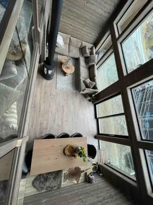 an overhead view of a room with a table and windows at Rindabotn Fjelltun ski in-ski out in Sogndal