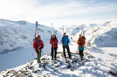 a group of people standing on top of a snow covered mountain at Bessheim Fjellstue og Hytter in Bessheim
