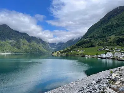 a view of a body of water with mountains at Leilighet i Odda sentrum in Odda