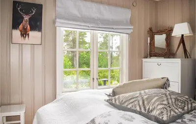 a bedroom with a bed and a window at 3 Bedroom Nice Home In Gol in Gol