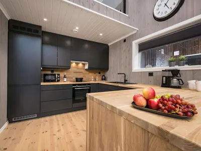 a kitchen with a bowl of fruit on a counter at Holiday Home Mathias by Interhome in Vik