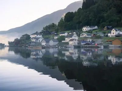 a village on the shore of a body of water at Holiday Home Mathias by Interhome in Vik
