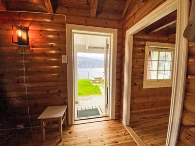 a room with a window in a log cabin at Chalet Krampehaugen by Interhome in Utvik