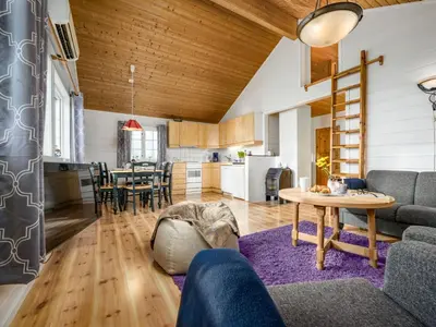 a living room with a couch and a table at Chalet Hagehytta by Interhome in Utvik