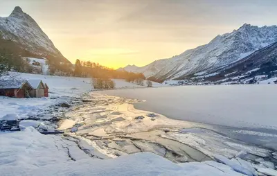 a winter scene of a river in the mountains at Nice Home In Straumgjerde in Riksem