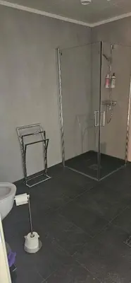 a bathroom with a shower and a toilet at Panorama view in Stranda
