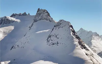 a view of a mountain with snow on it at 2 Bedroom Cozy Home In Straumgjerde in Riksem