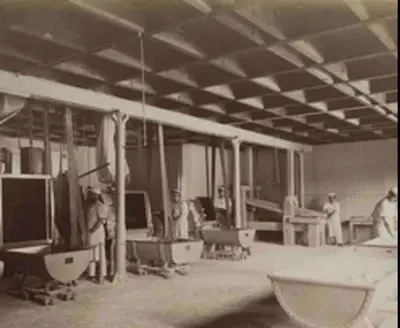 a black and white photo of people in a room at The old bakery in Sandviken in Bergen
