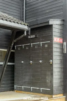 a pair of closed garage doors in a building at Hafjell Alpinlandsby Apt 88 in Hafjell