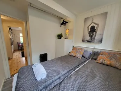 a bed with two pillows in a bedroom at Mars Modern and Cozy Apartment in the centre, Free Parking in Trondheim