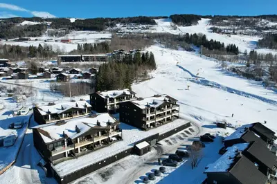 an aerial view of a ski resort in the snow at Hafjelltunet in Hafjell