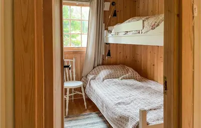 a bedroom with two bunk beds and a window at Lovely Home In Eggedal With Wifi in Eggedal