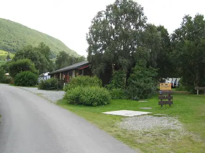 a house on the side of a road at Smegarden Camping in Oppdal