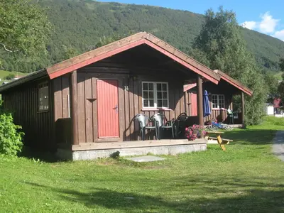 a small house with two horses in it at Smegarden Camping in Oppdal