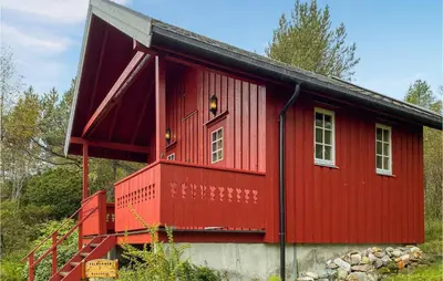 a red house with a red roof at Beautiful Home In Tustna With Wifi in Gullstein
