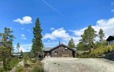 a house on the side of a hill at Cozy Home In Bjorli With Wifi in Bjorli