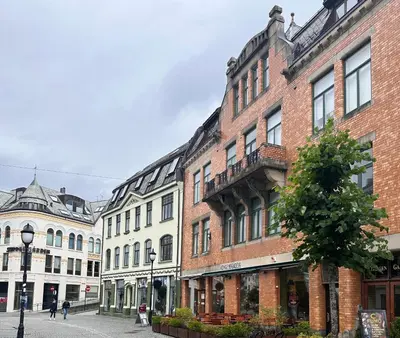 a group of buildings on a city street at Stunning penthouse in the city! in Ålesund
