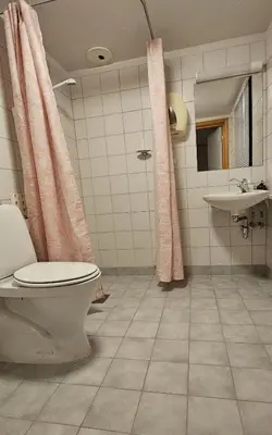 a bathroom with a toilet and a sink at Øyer Fjellstugu in Øyer