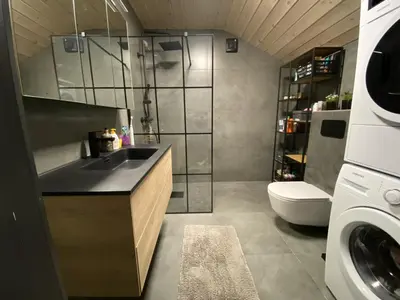 a bathroom with a sink and a toilet at Newly renovated apartment with a central location in Geilo