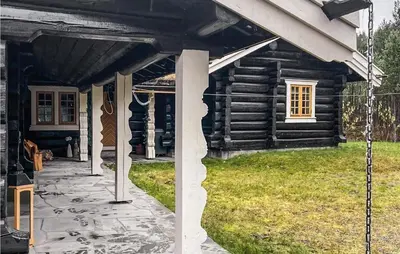 a front porch of a log cabin at Awesome Home In Hemsedal With Sauna in Hemsedal