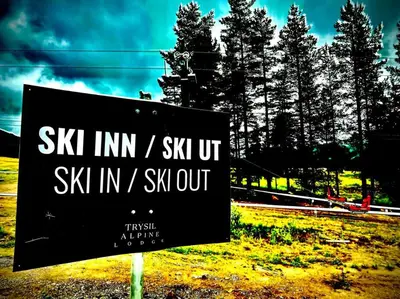 a sign that reads six inn z six up six in y six out at Topp studio leilighet Alpine Lodge in Trysil