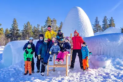 a group of people standing in front of an ice structure at Active Adventure Base - Apartment & Lavvo, Dagali Fjellpark in Dagali