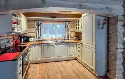 a kitchen with white cabinets and a sink at 3 Bedroom Gorgeous Home In Sjusjøen in Sjusjøen