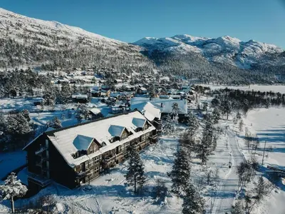 an aerial view of a resort in the snow at Hovdestøylen Apartments in Hovden