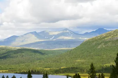 a view of a mountain range with a lake at Maurtua - cabin in lovely surroundings in Kvam