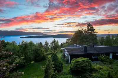 a house on a hill with a view of a lake at Mountain & Lake Haven & Close to Oslo in Stange