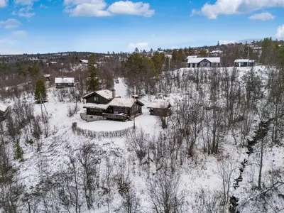 an aerial view of a house in the snow at Large cabin with spectacular views in Geilo in Geilo