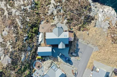 an aerial view of a house on the beach at Fjordcabin Panoramic view Near Bergen 3 sleepingroom in Forland