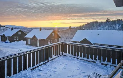 a winter view of a house with snow at Gorgeous Home In Rauland With Kitchen in Rauland
