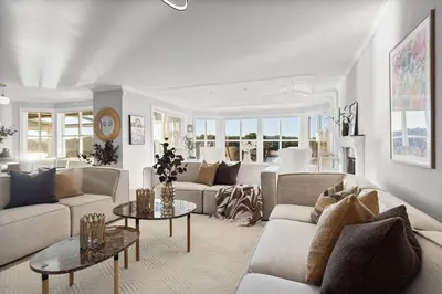 a living room with two couches and a table at Waterfront Villa w/Boat&kayaks. 15min from Bergen in Foldnes